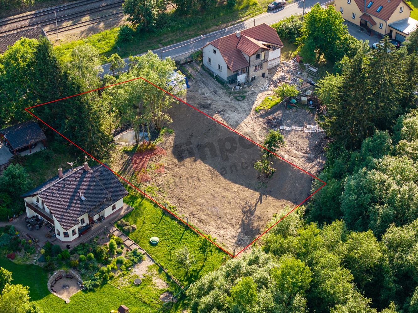Prodej stavebního pozemku 1 000 m², Postupice
