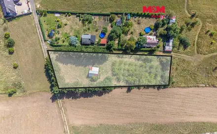 Prodej stavebního pozemku 2 434 m², Křenek, okres Praha-východ