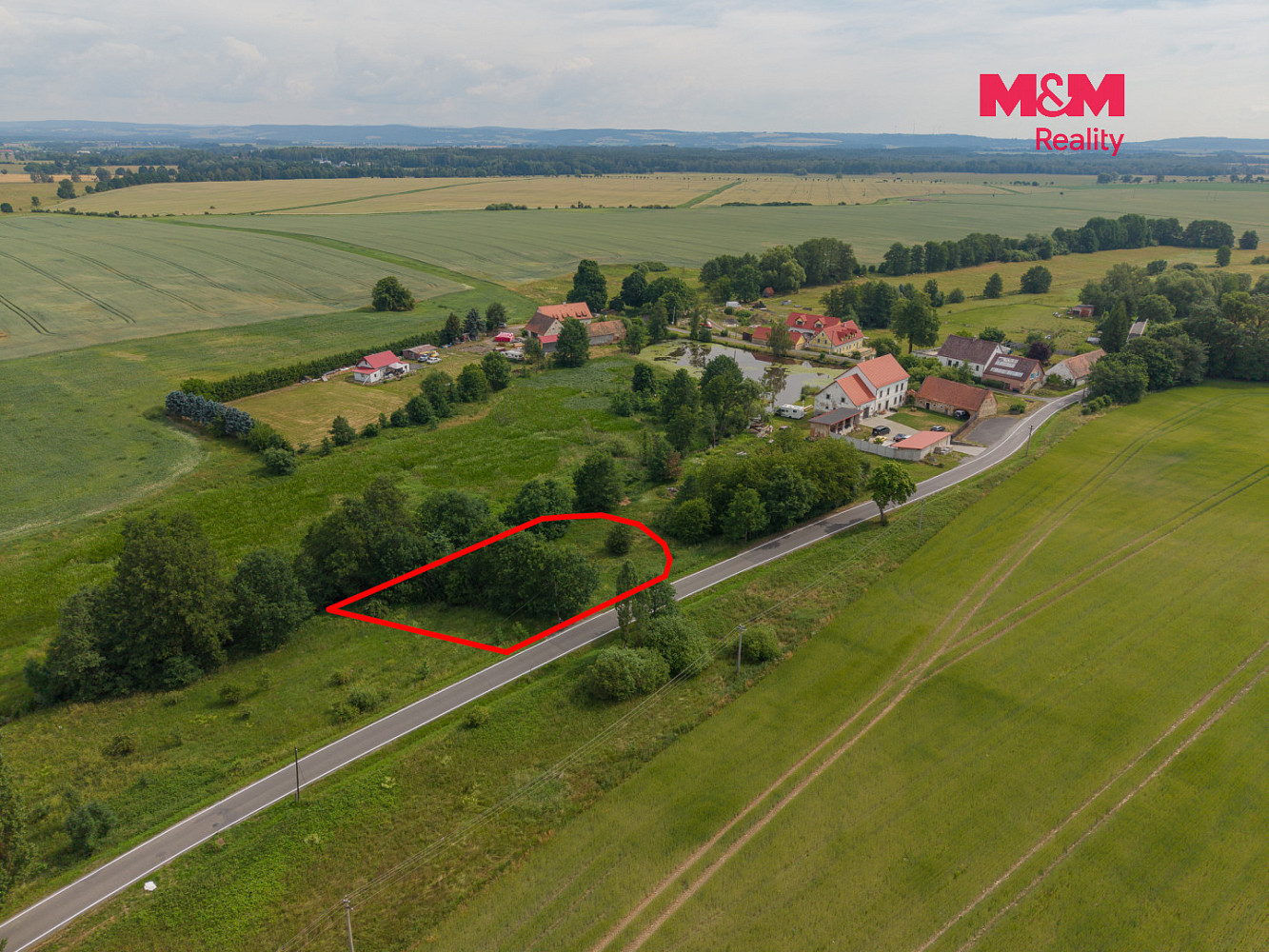 Prodej stavebního pozemku 975 m² — photo 2