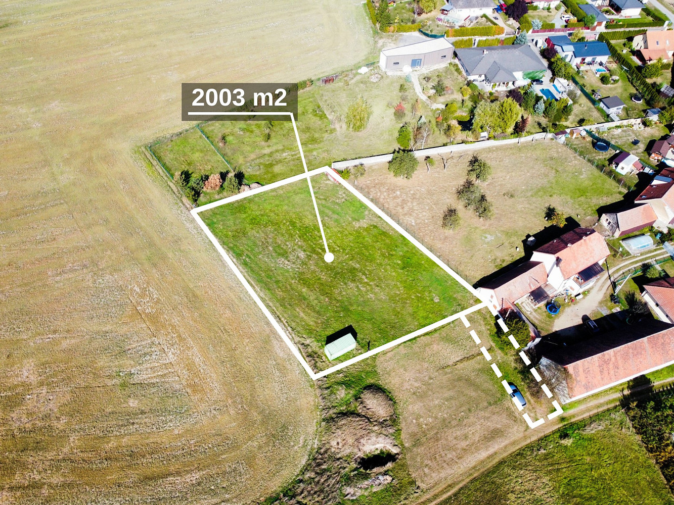 Prodej stavebního pozemku 2 003 m² – fotografie 2