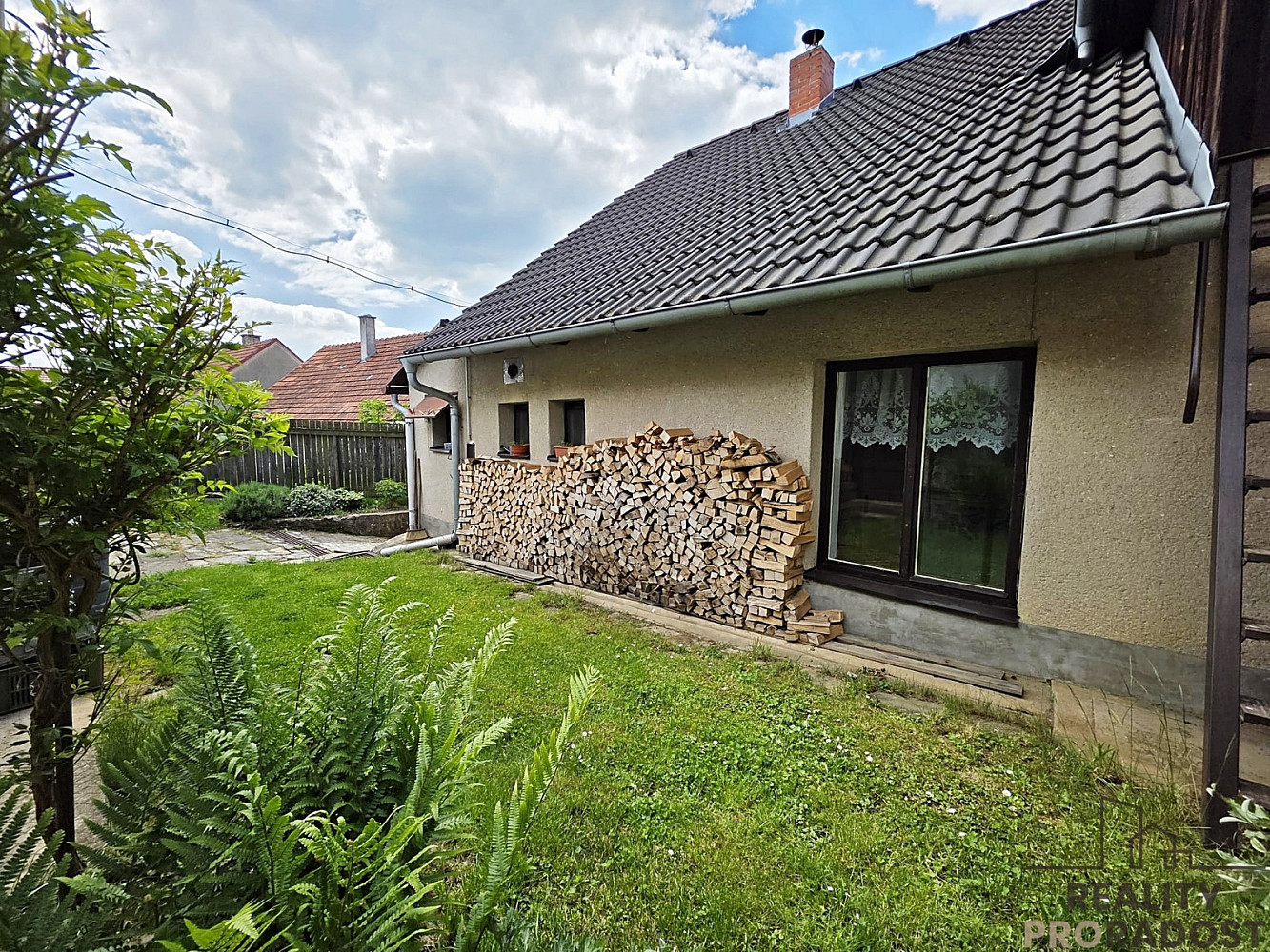 Prodej domu 94 m² s pozemkem 562 m² — photo 2