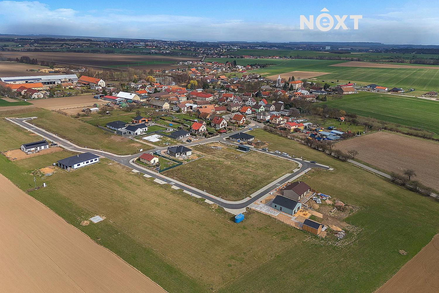 Prodej stavebního pozemku 911 m² – pohled 4