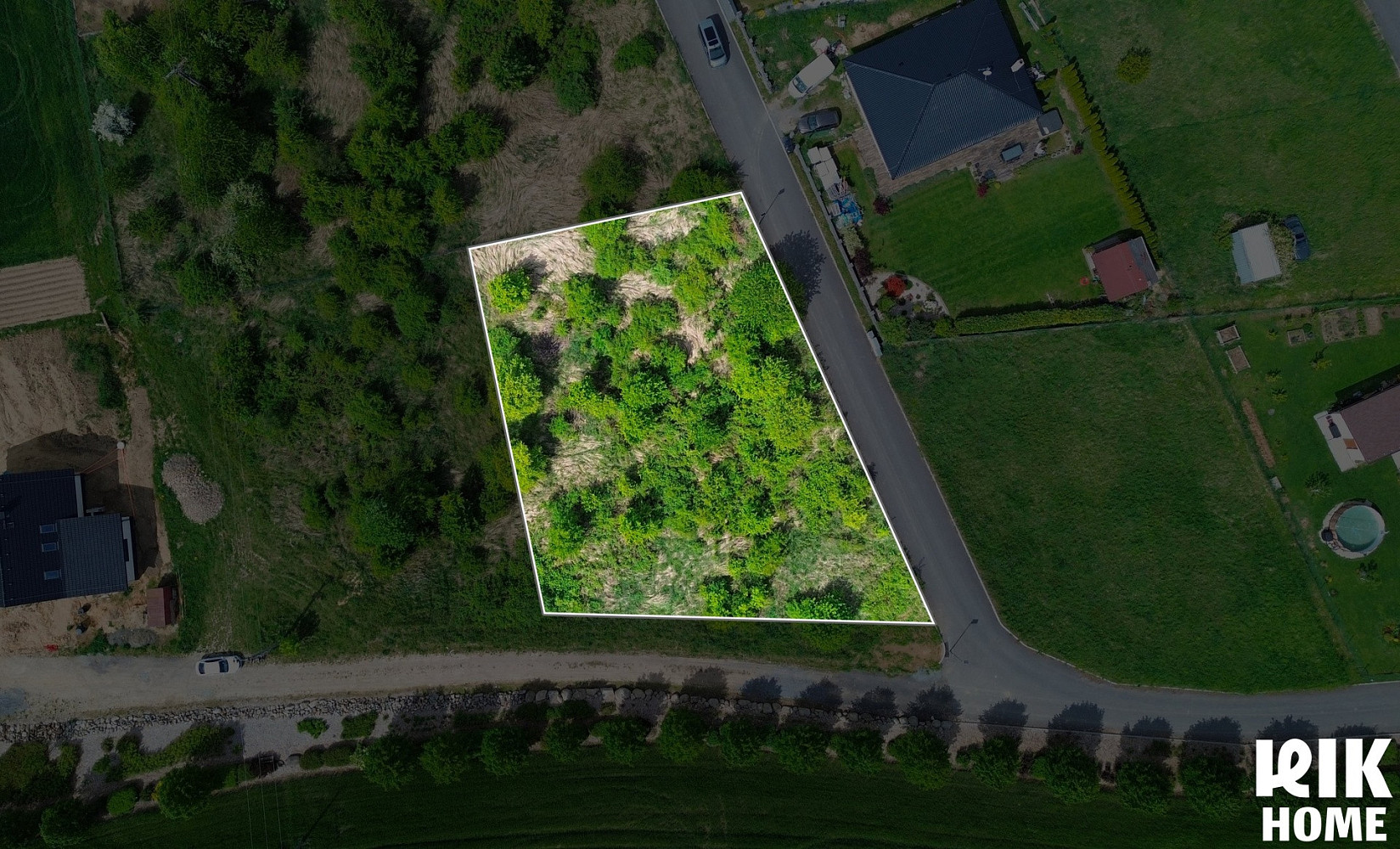 Prodej stavebního pozemku 1 617 m² – pohled 2