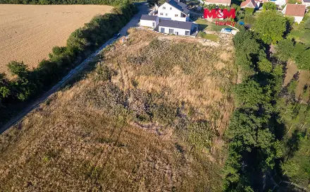 Prodej stavebního pozemku 1 025 m², Malíkovice, okres Kladno