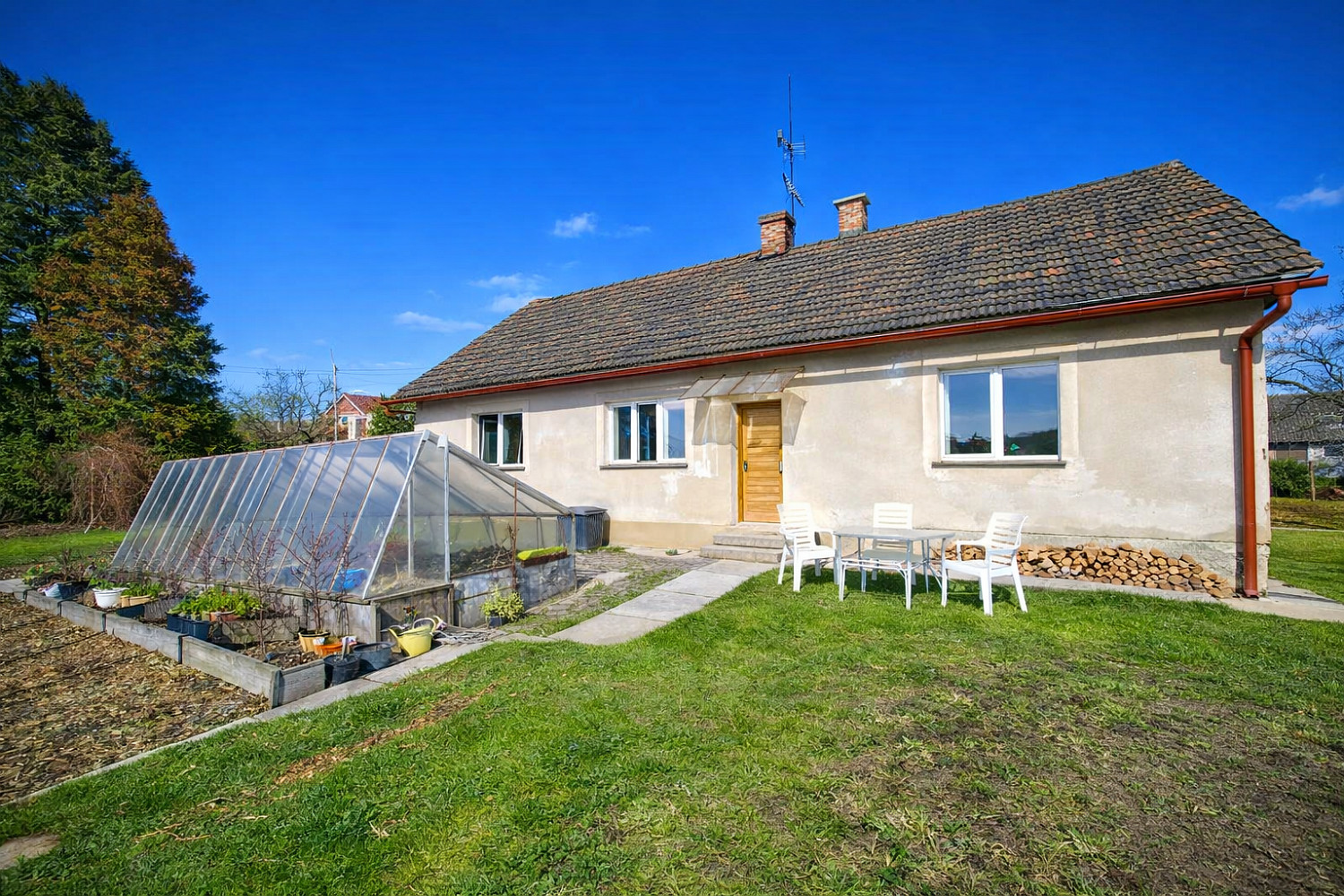 Prodej domu 100 m² s pozemkem 1 000 m²