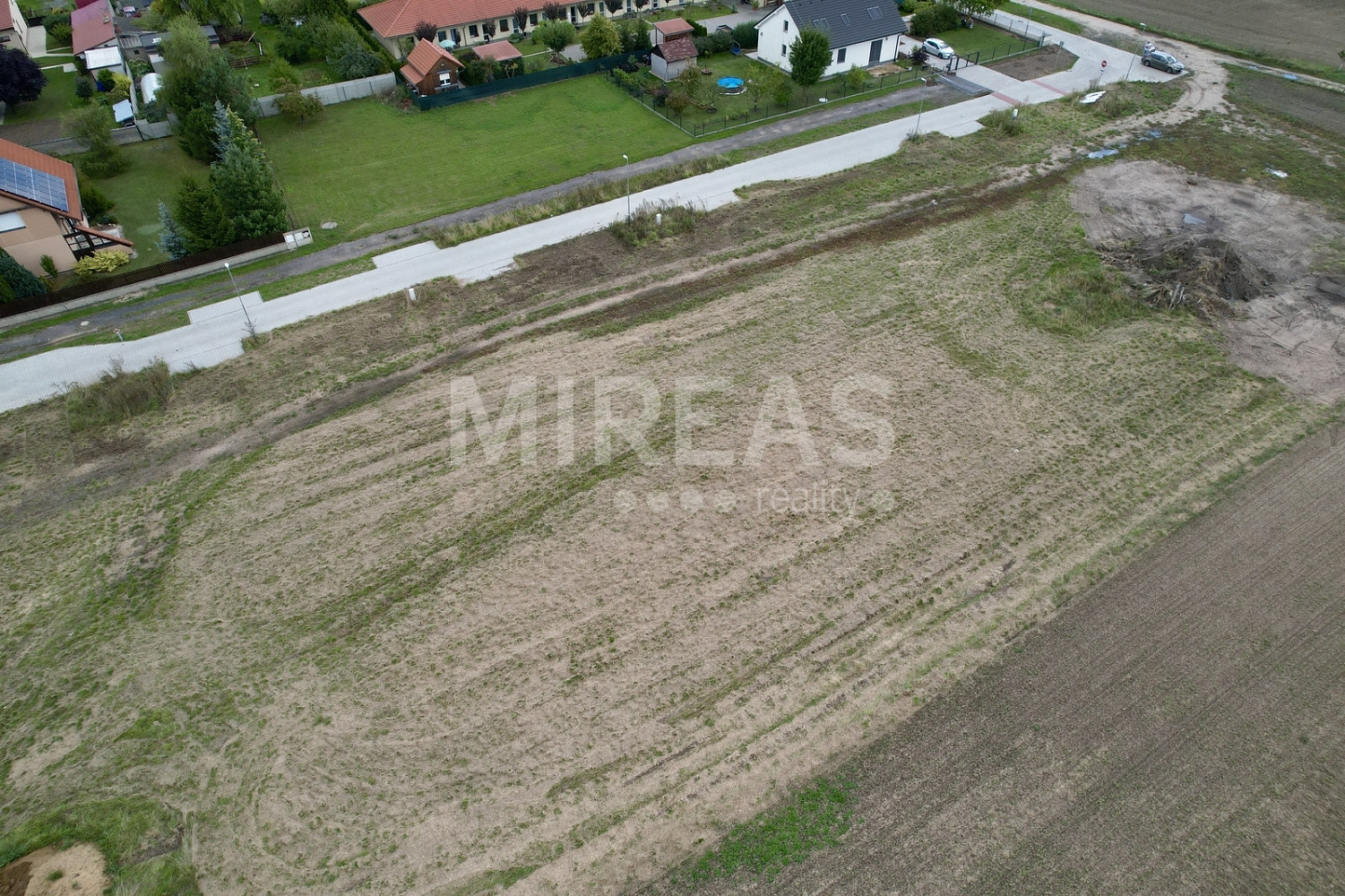 Prodej stavebního pozemku 909 m² – fotografie 4