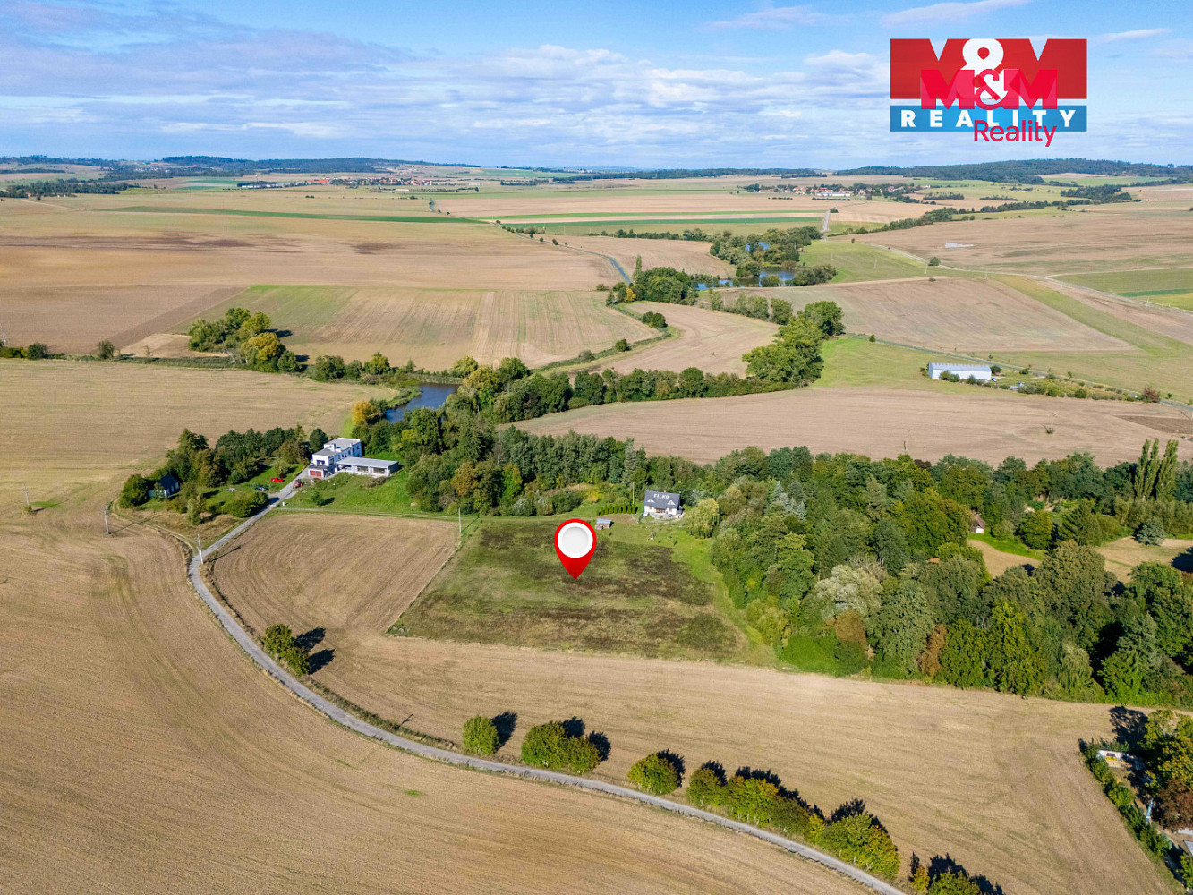 Prodej stavebního pozemku 999 m² – fotografie 4