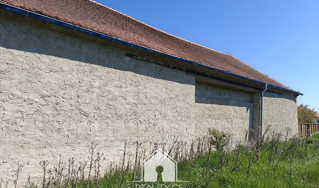 Prodej stavebního pozemku 1 419 m², Postoloprty – náhled fotky 2