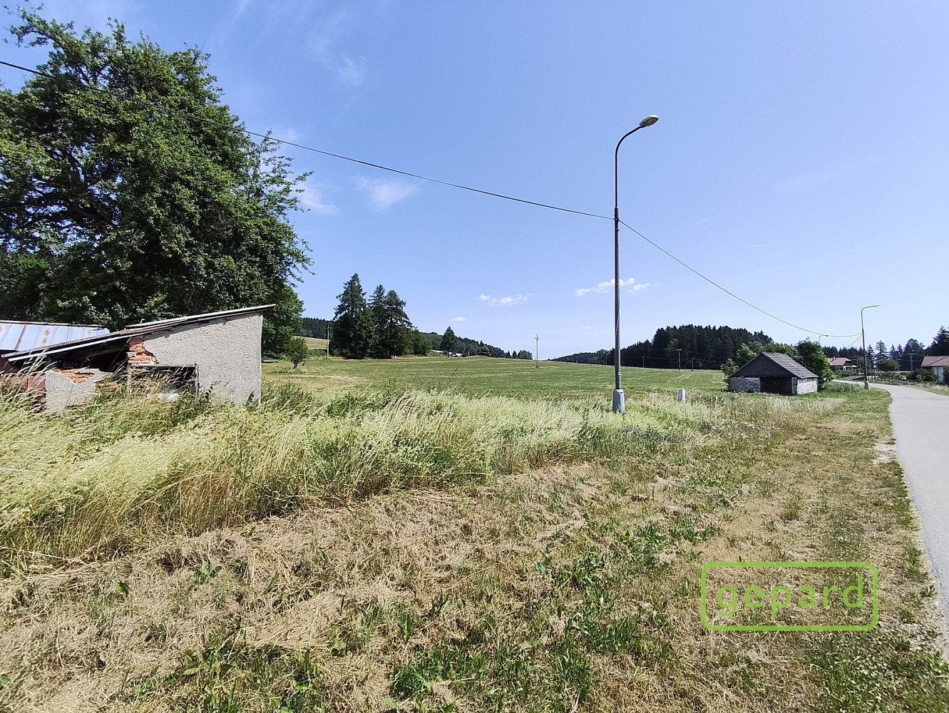 Prodej stavebního pozemku 892 m² – pohled 3