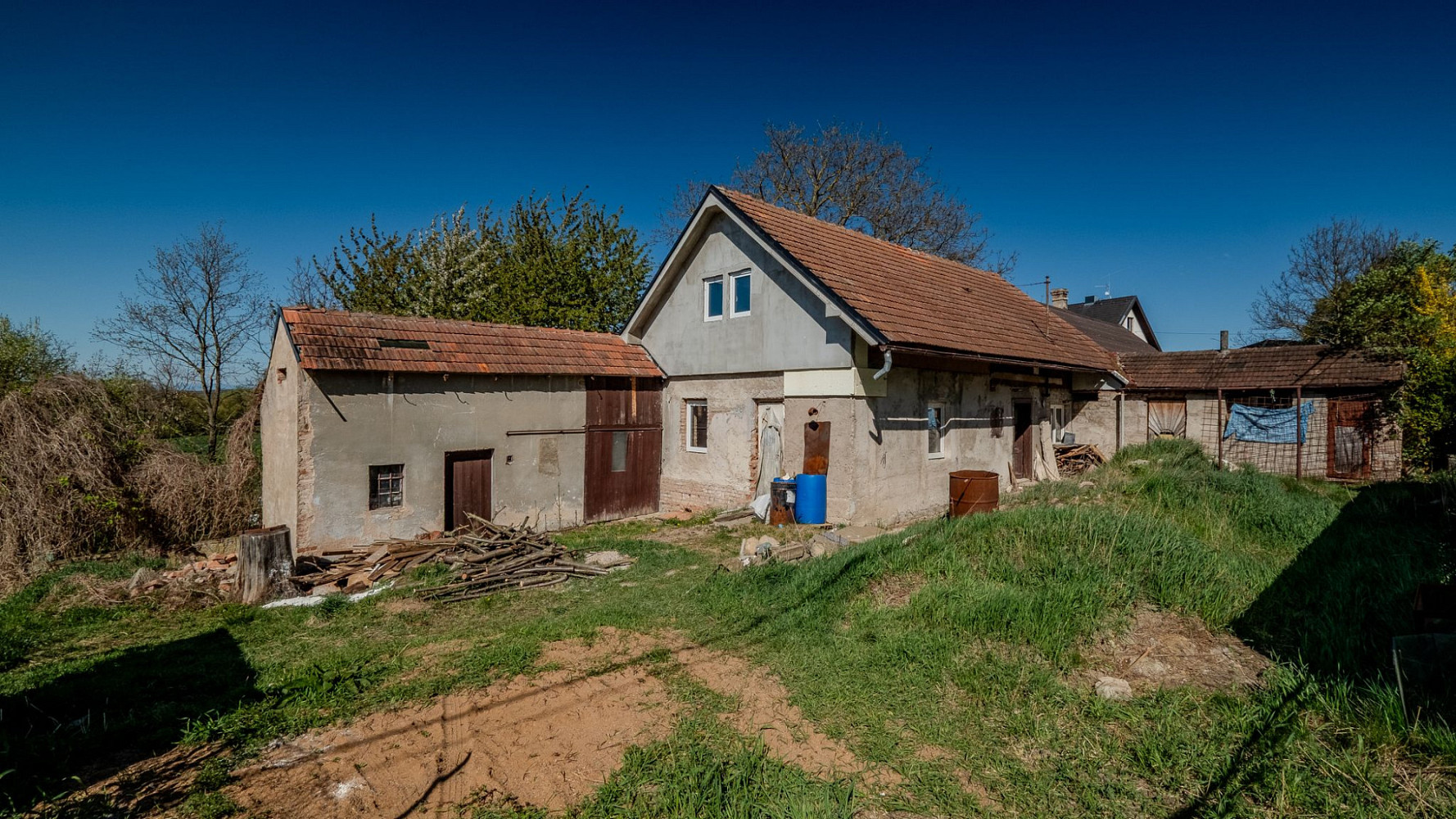 Prodej domu 58 m² s pozemkem 1 210 m²