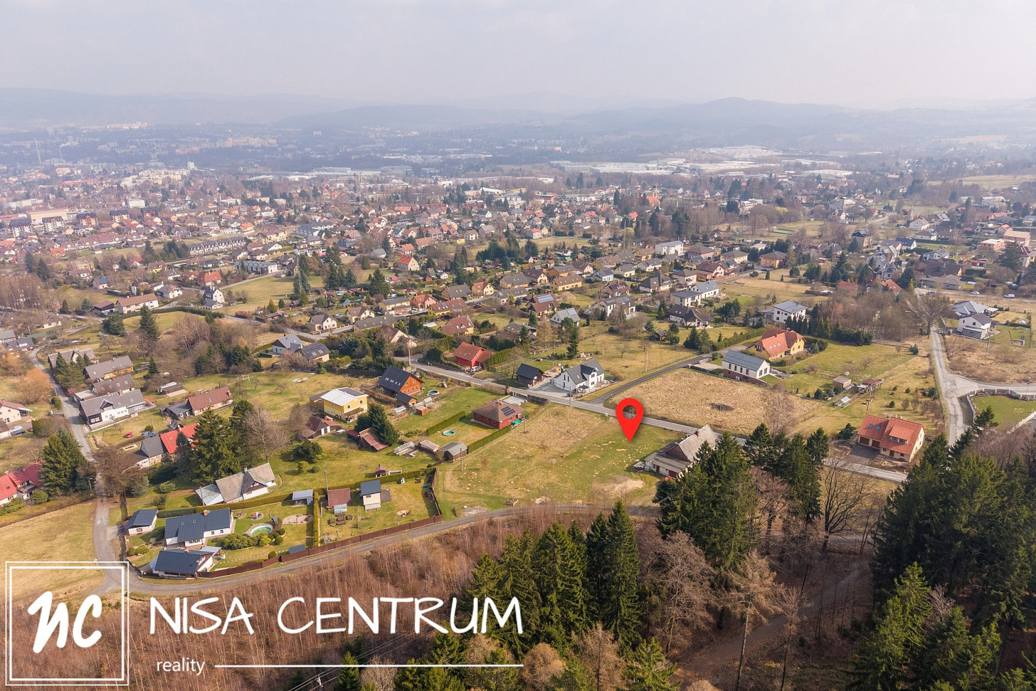 Prodej stavebního pozemku 727 m² – pohled 2