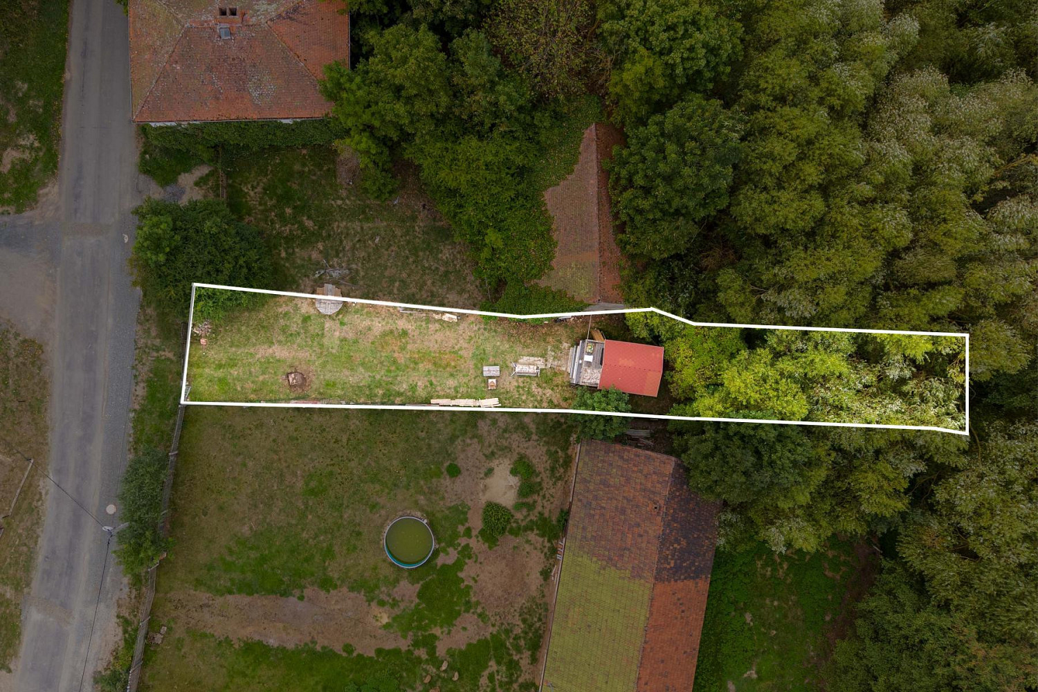 Prodej stavebního pozemku 411 m² – fotografie 3