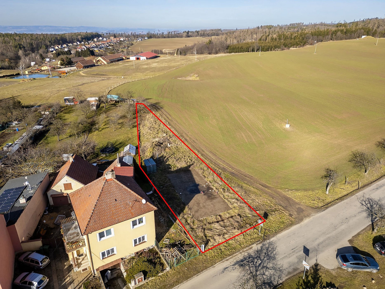 Prodej stavebního pozemku 865 m² – pohled 2
