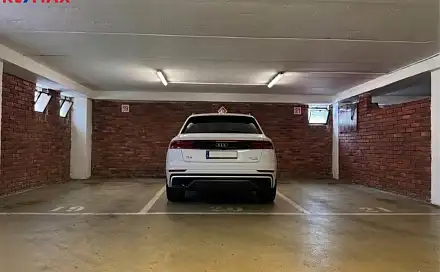 Pronájem parkovacího stání v garážovém domě ihned k dispozici, Praha 6