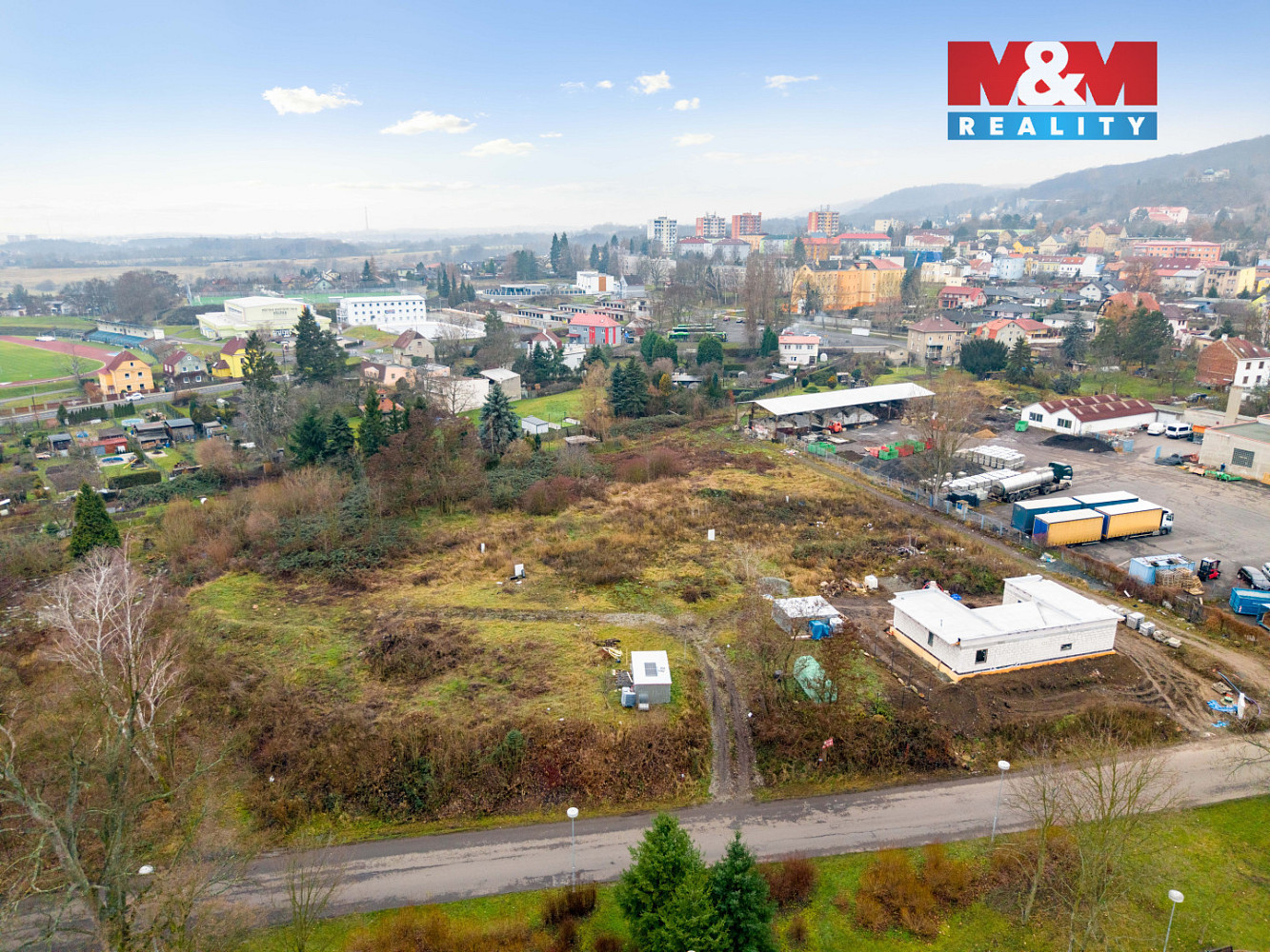 Prodej stavebního pozemku 883 m² – pohled 3