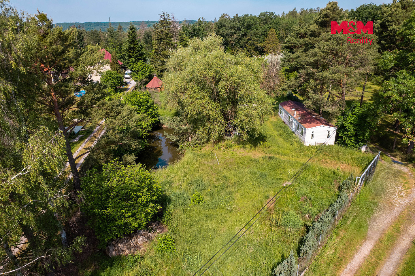 Prodej stavebního pozemku 1 945 m² – fotografie 2