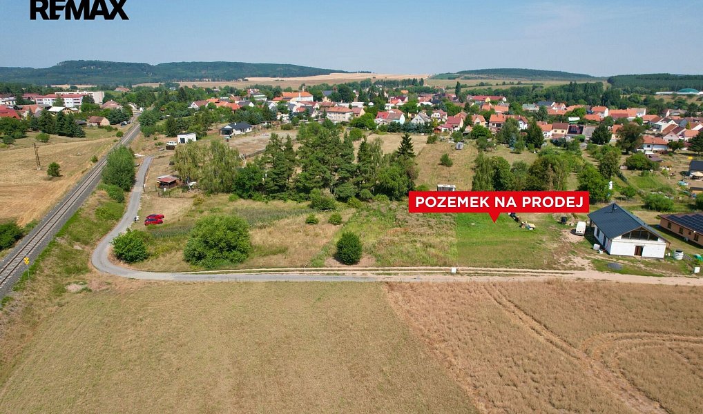 Prodej stavebního pozemku 1 268 m², Vroutek – náhled fotky 2