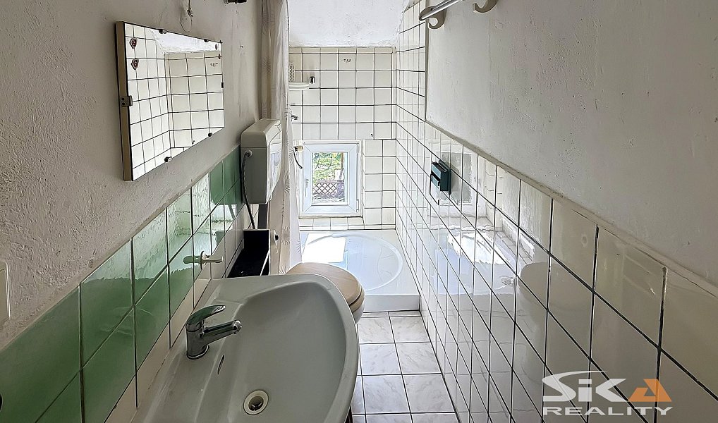 Prodej domu 110 m² s pozemkem 141 m², Louny – náhled fotky 29
