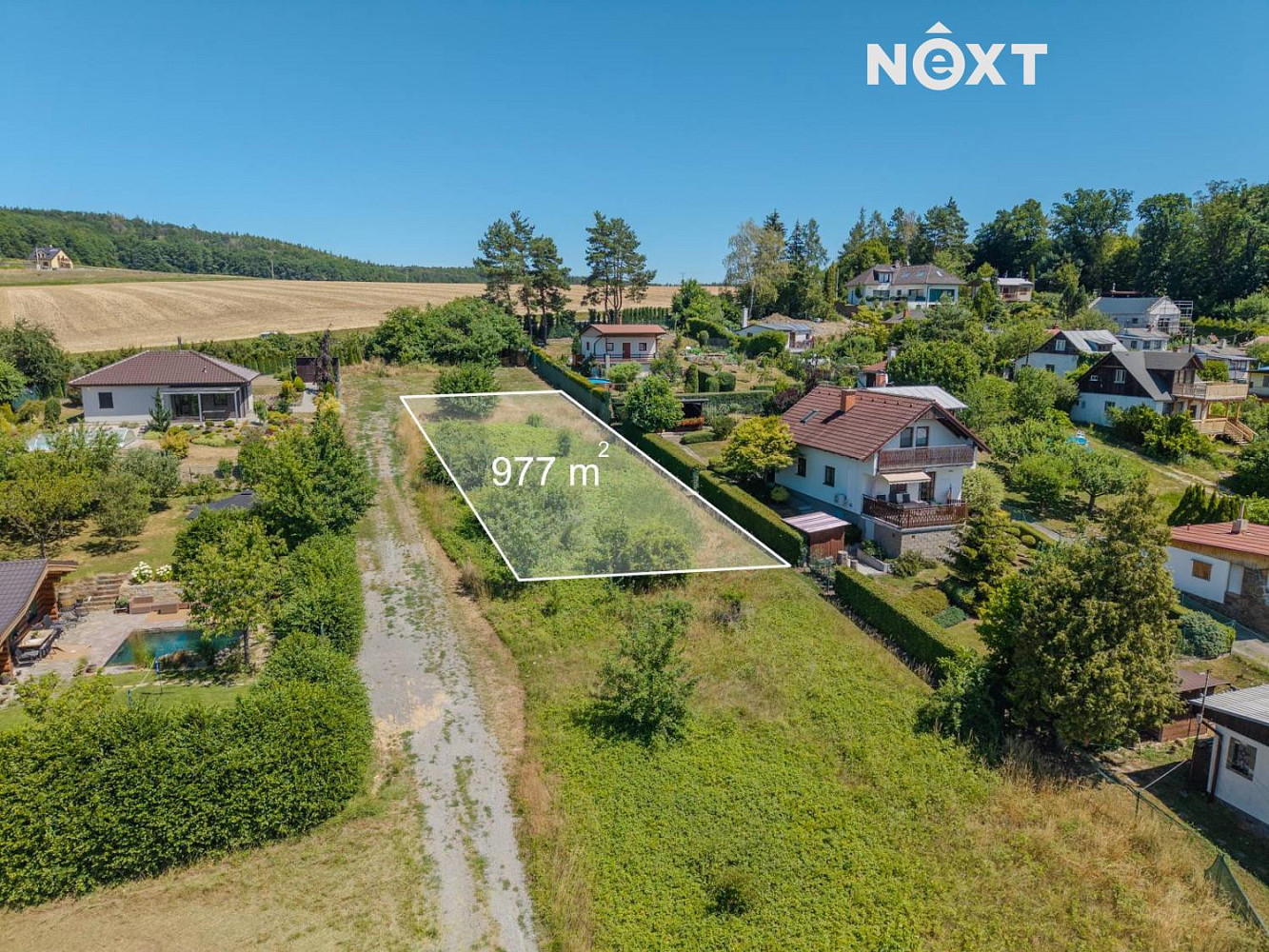 Prodej stavebního pozemku 977 m² – fotografie 5