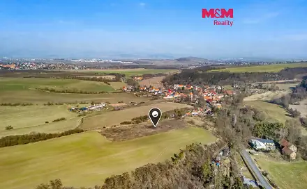 Prodej stavebního pozemku 1 068 m², Louny - Brloh