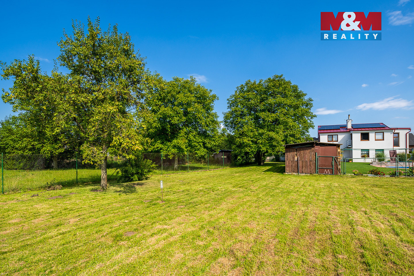 Prodej stavebního pozemku 1 676 m² – pohled 3