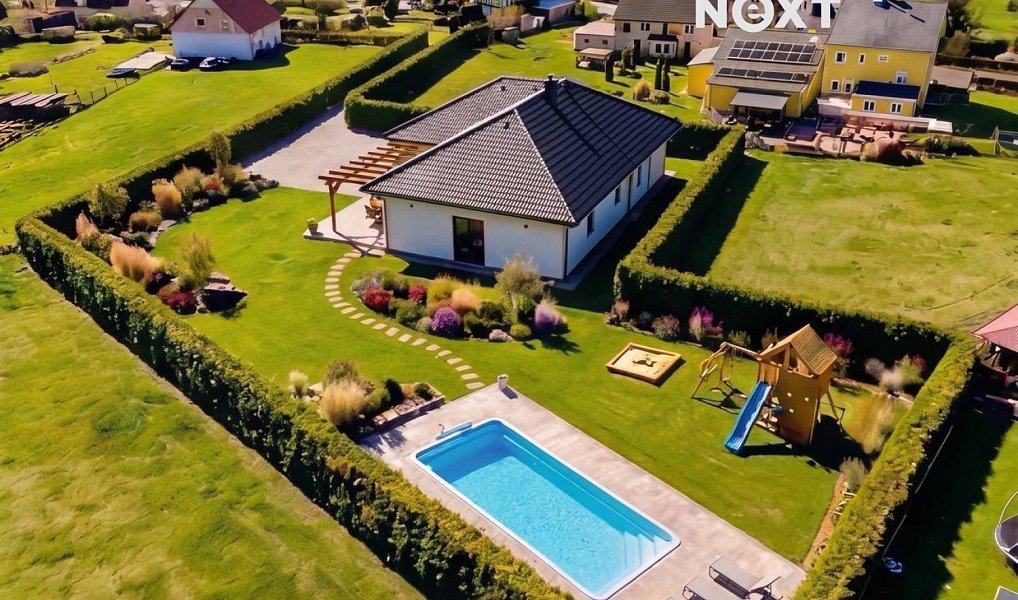 Prodej stavebního pozemku 2 246 m², Pila – náhled fotky 2