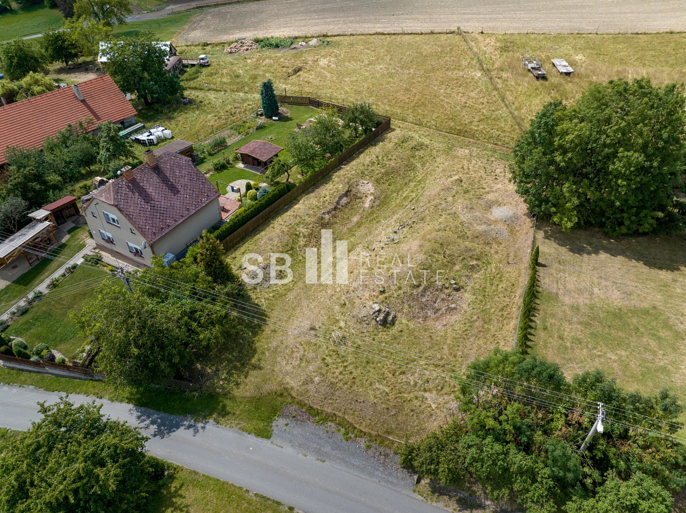Prodej stavebního pozemku 1 092 m² – pohled 3