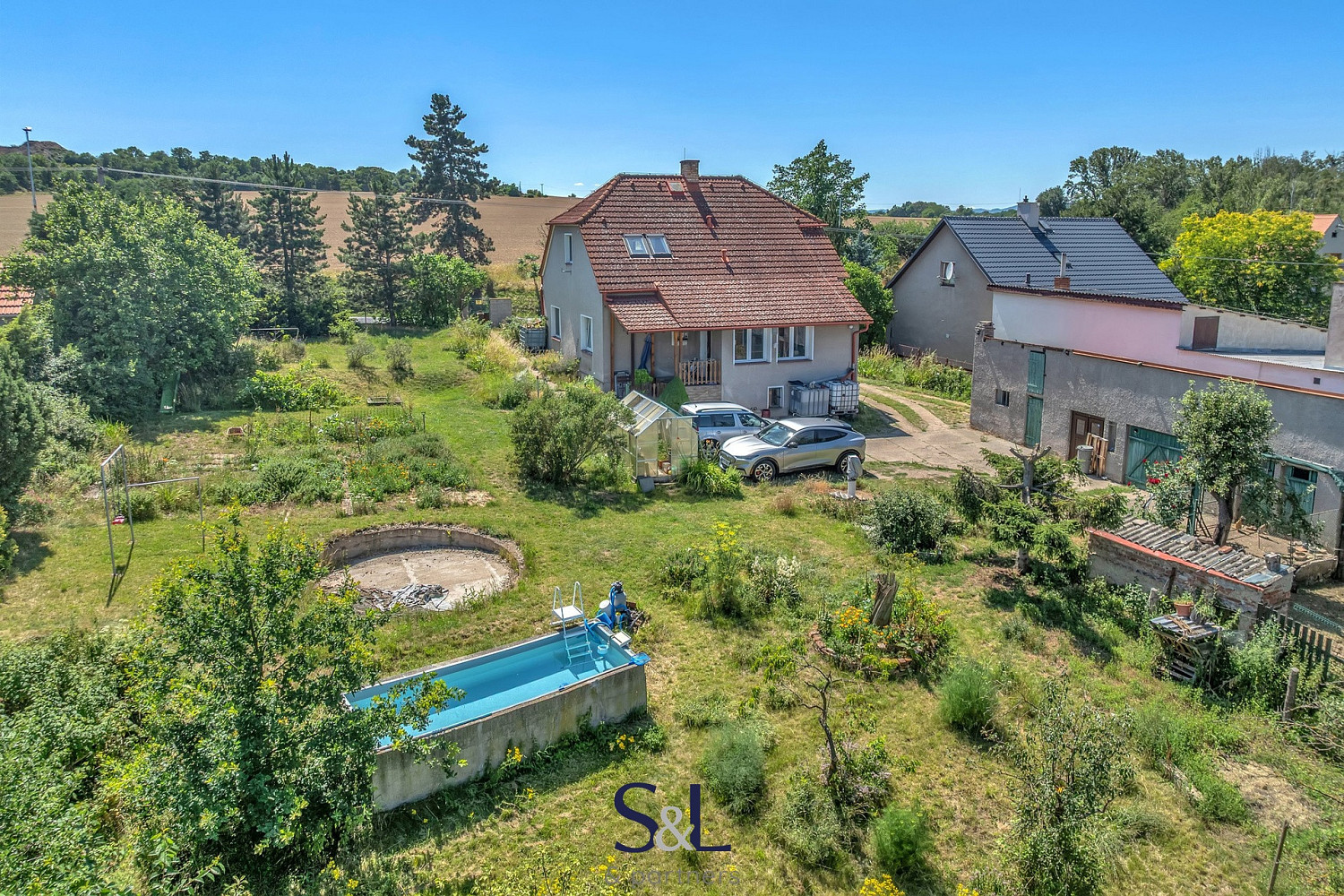 Prodej domu 240 m² s pozemkem 1 661 m²