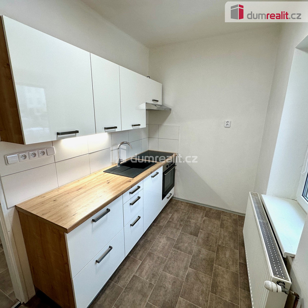 Pronájem bytu 1+1 36 m² — photo 2