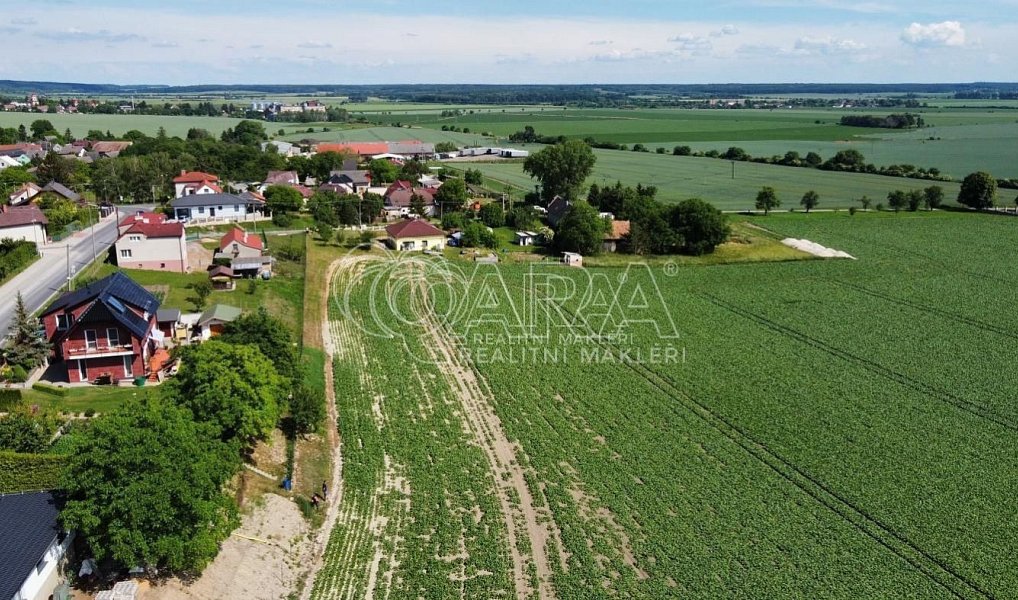 Prodej stavebního pozemku 1 121 m², Dobrovice – náhled fotky 4