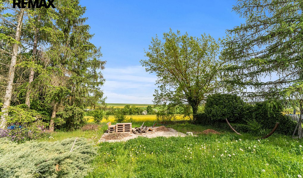 Prodej stavebního pozemku 950 m², Mořina – náhled fotky 10