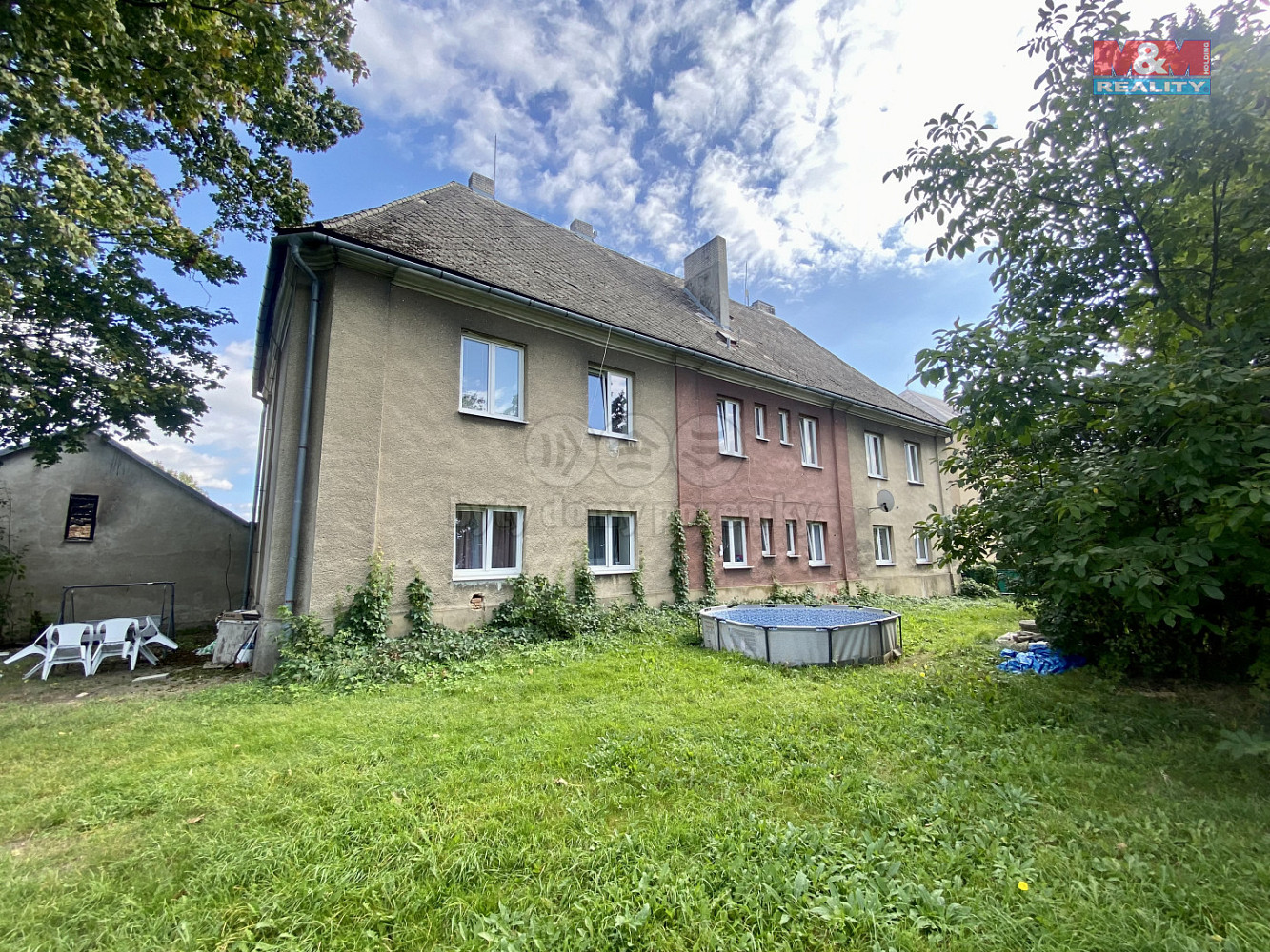 Prodej nájemního domu, činžáku 386 m²