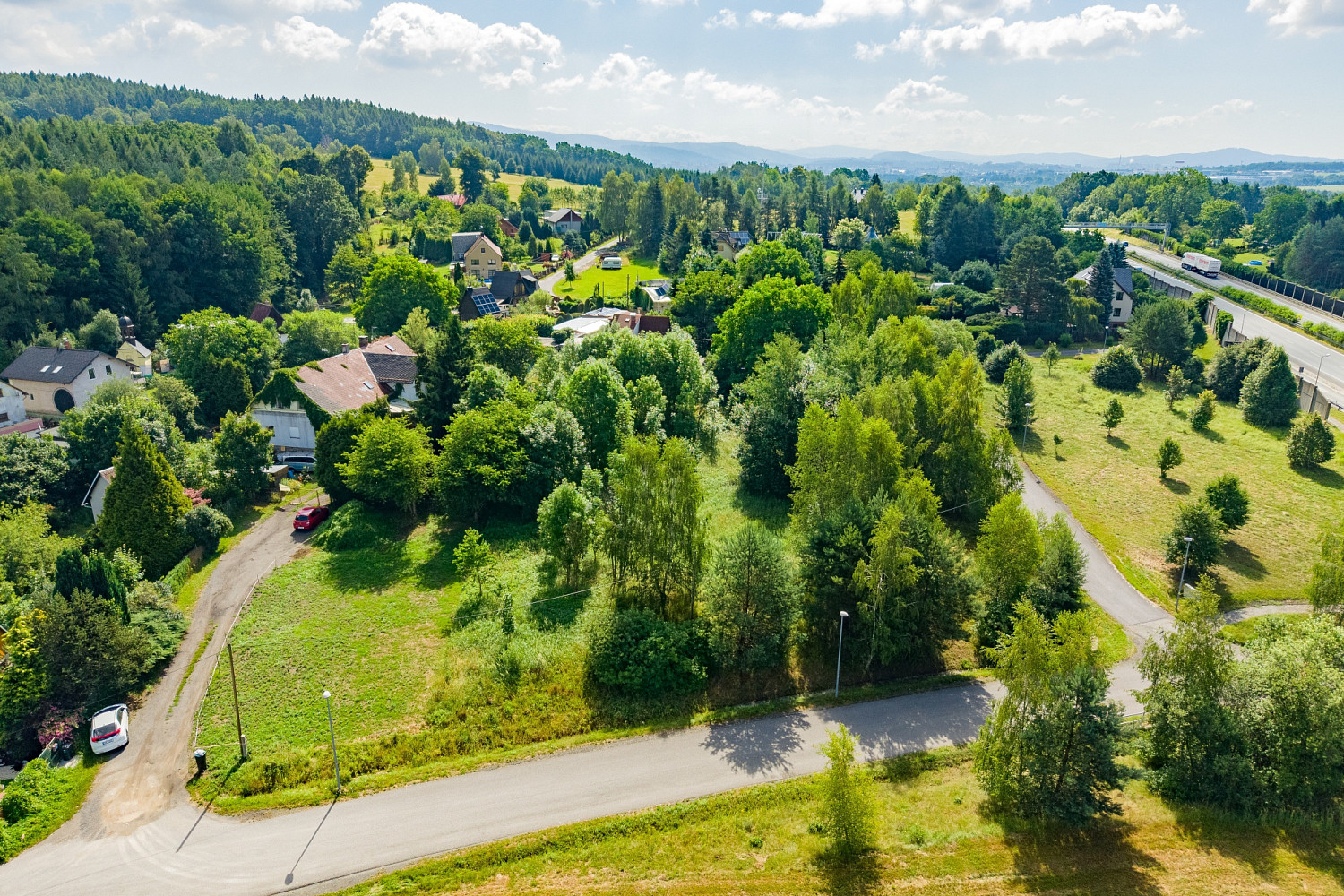 Prodej stavebního pozemku 2 392 m² - Widok 3