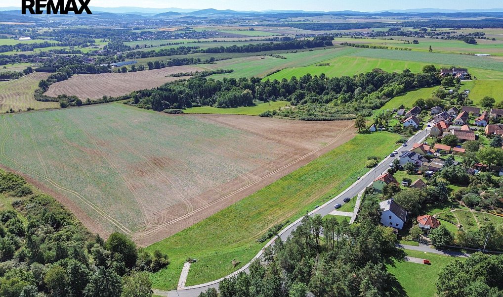 Prodej stavebního pozemku 800 m², Chlumčany – náhled fotky 6