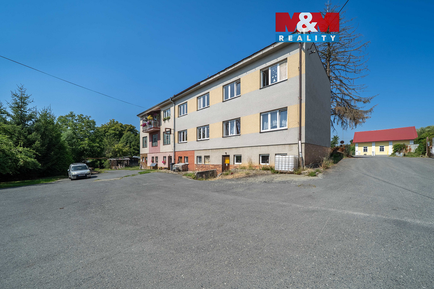 Prodej nájemního domu, činžáku 290 m²