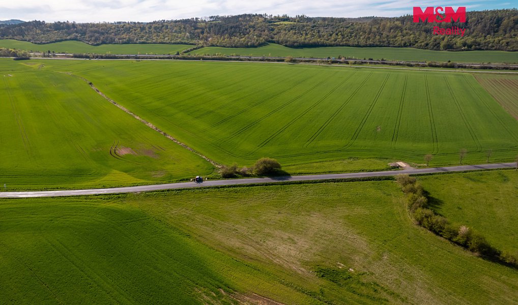 Prodej stavebního pozemku 1 000 m², Chlustina – náhled fotky 9