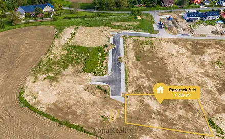Prodej stavebního pozemku 1 288 m², Komárov, okres Olomouc