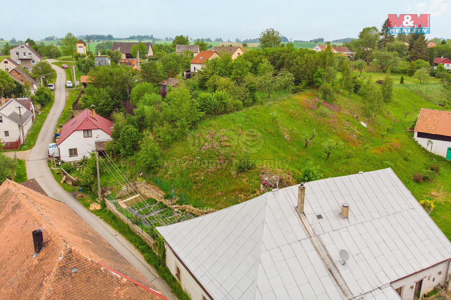 Prodej stavebního pozemku 987 m² — photo 2