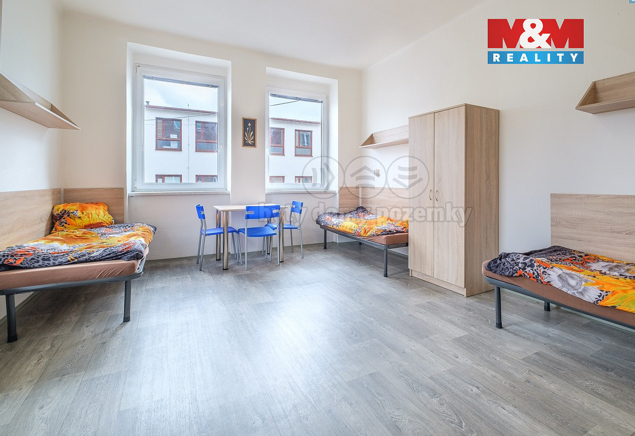 Prodej nájemního domu, činžáku 1 318 m² — photo 2