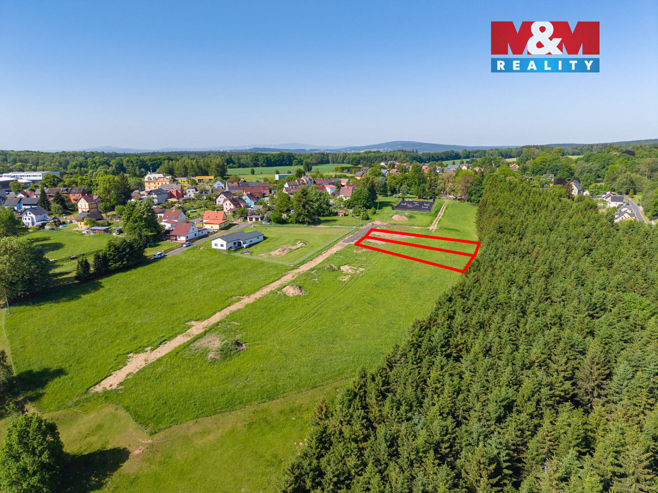 Prodej stavebního pozemku 1 000 m² – fotografie 3