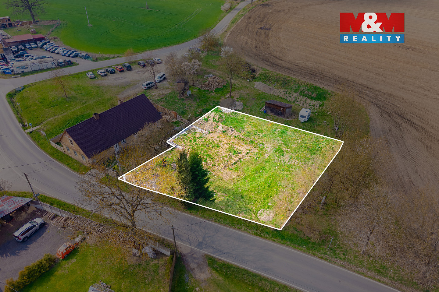 Prodej stavebního pozemku 877 m² - Veduta 2