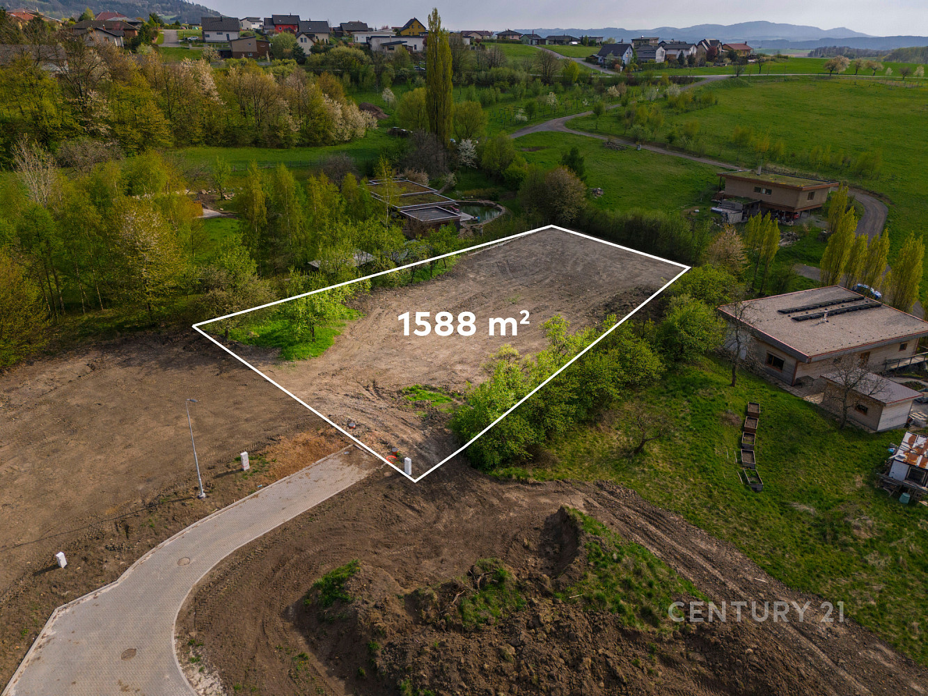 Prodej stavebního pozemku 1 588 m² – pohled 6