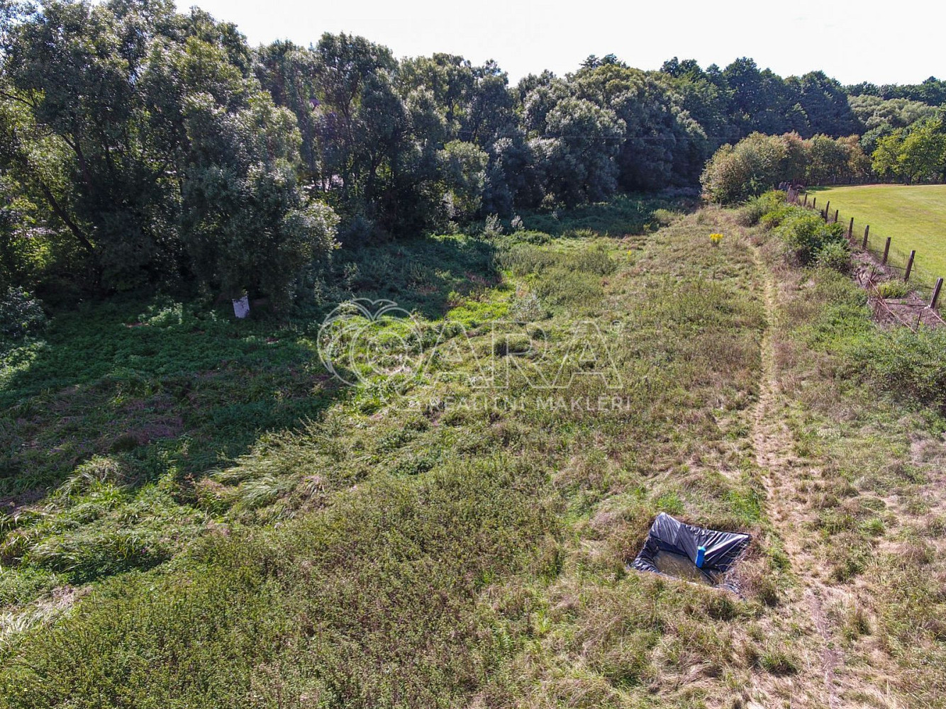 Prodej stavebního pozemku 2 624 m² – pohled 4