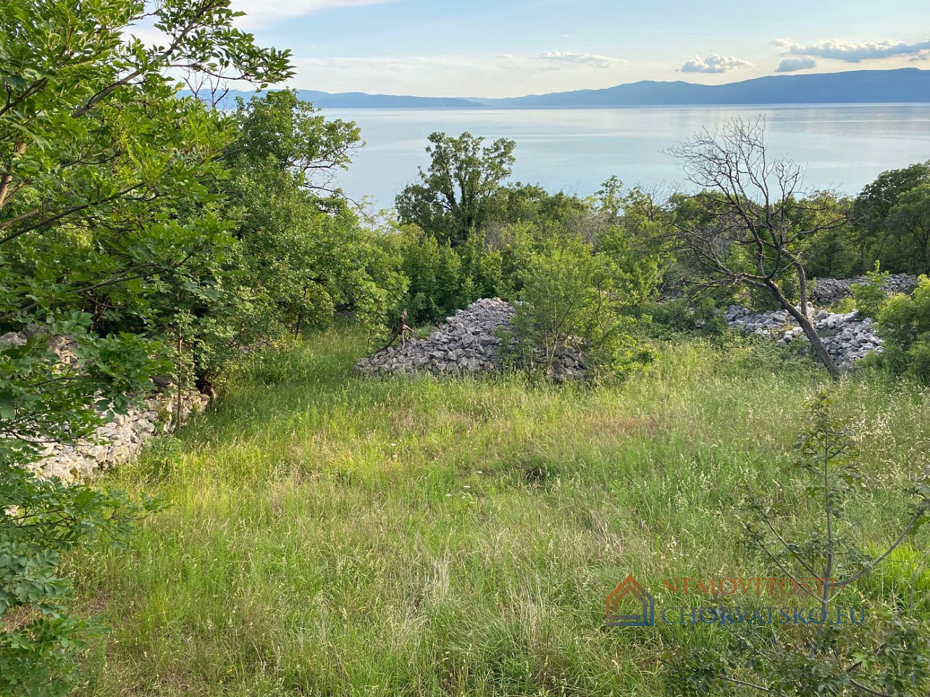 Prodej stavebního pozemku 1 211 m², Kostrena
