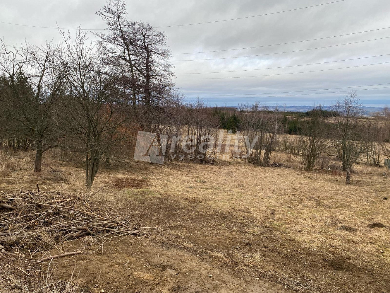 Prodej stavebního pozemku 1 268 m² – pohled 2