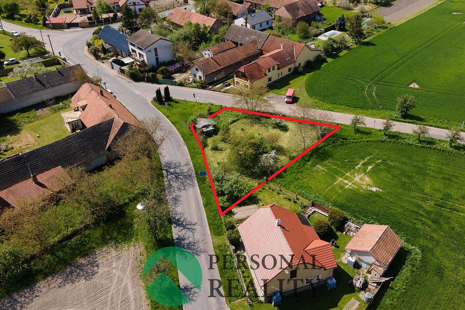 Prodej stavebního pozemku 910 m² – pohled 6