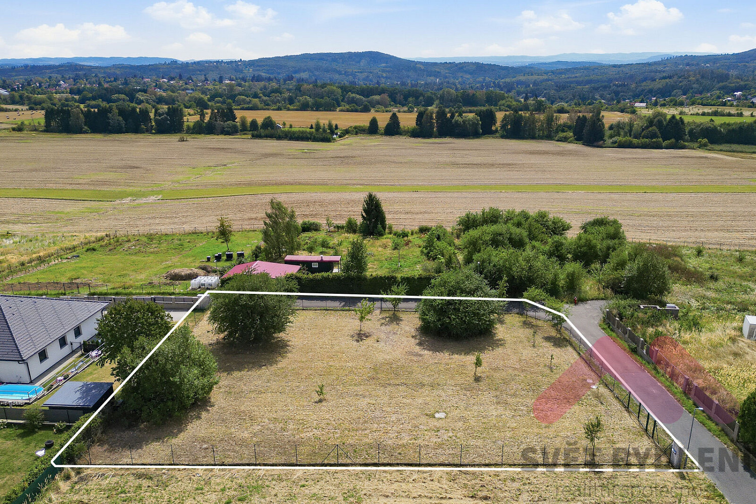 Prodej stavebního pozemku 1 597 m² – fotografie 3