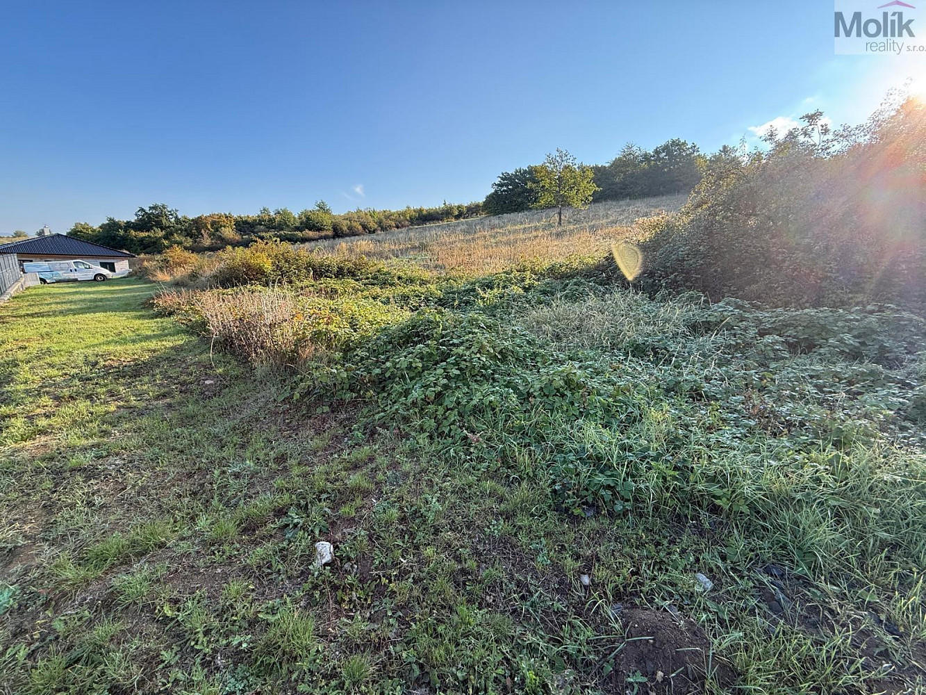 Prodej stavebního pozemku 1 645 m² – pohled 3
