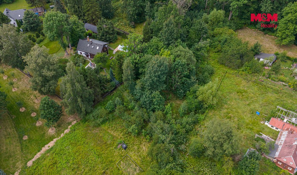 Prodej stavebního pozemku 1 596 m², Staré Křečany – náhled fotky 2