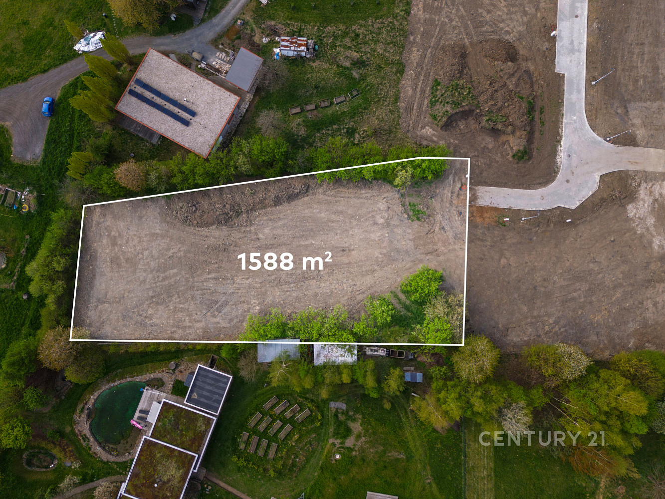 Prodej stavebního pozemku 1 588 m² – pohled 3